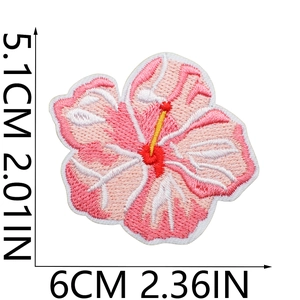 Detailed embroidery patch showing dimensions of pink flower with fine thread textures