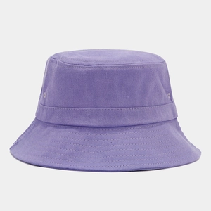 Detail of purple cotton bucket hat showing parallel brim stitching and metal eyelets