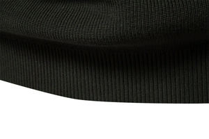 Macro shot of high-density knitted ribbed hem and elastic texture on a men's business sweater