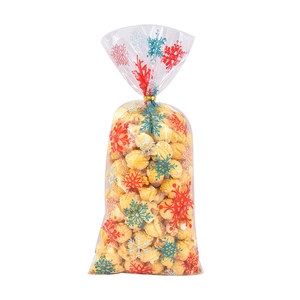 Sachet transparent de Noël pour bonbons avec flocons de neige et attache dorée torsadée