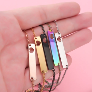 Polished stainless steel bar necklaces with heart cutouts in five vibrant metallic colors