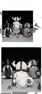 Detailed view of Viking gnome plush ornaments with horned helmets and axes