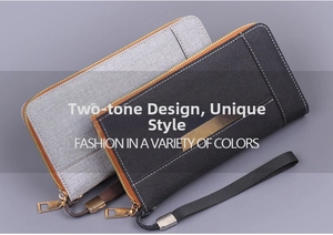 Détail de pochette homme en toile avec texture tissée, zip métallique et dragonne