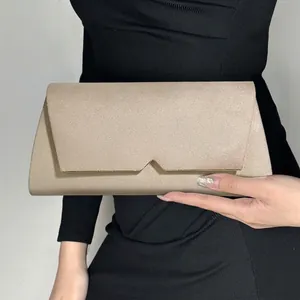 Elegant champagne velvet clutch evening bag with geometric V-cut envelope flap design