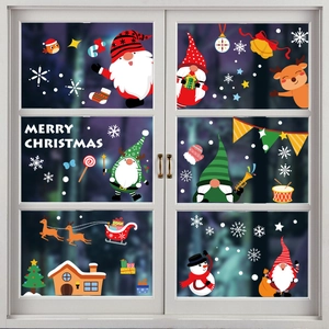 Christmas window decals with Santa, reindeer and snowman on glass panel decor