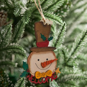 Festive 12cm wooden snowman ornament with welcome text hanging on a Christmas tree