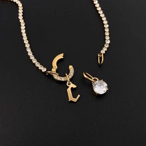 Gold-plated titanium steel bracelet with rhinestone initial L and crystal charms