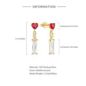 Detail of 925 sterling silver earrings with red heart and white zircon stones