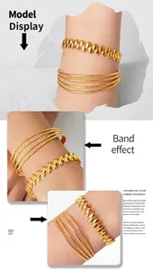 Detail view of 18K gold plated vintage cuff set with beads and layered metal bangles