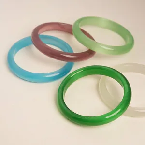 Cat eye stone bracelets in five vibrant colors with a smooth polished finish