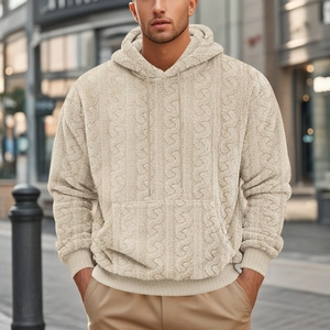 Close-up of beige men's jacquard teddy fleece hoodie showing waffle texture and hood detail