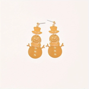 Detailed close-up of golden snowman-shaped alloy drop earrings for holiday parties