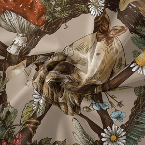 Close-up of bohemian tapestry fabric featuring mushroom and floral illustration prints