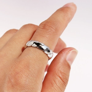 Silver twisted woven style open ring in high polished metal finish for men and women