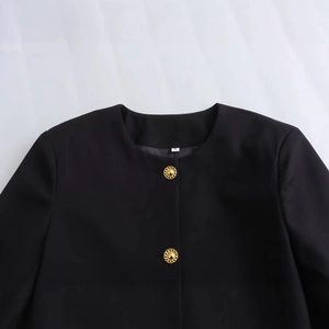 Women's black crew neck jacket with stylish gold buttons on smooth twill fabric