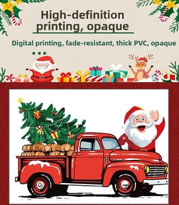 Detail of Christmas window sticker showing a red truck and Santa in high-quality PVC