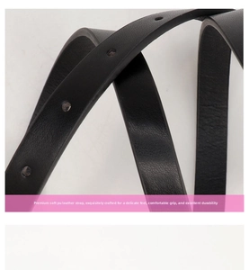 Detail of soft black PU leather belt strap showing fine texture and adjustment holes