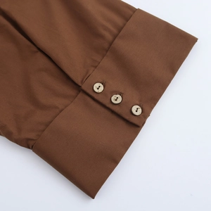Brown poplin shirt for women featuring wide sleeves and three-button cuff details