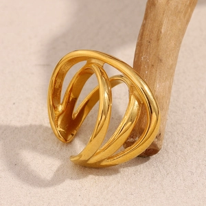 Detailed view of 18K gold plated stainless steel multi-layer overlapping cross ring