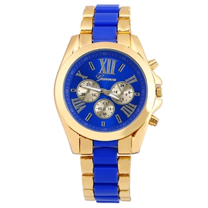 Detailed close-up of blue and gold Geneva quartz watch with Roman numerals and steel band
