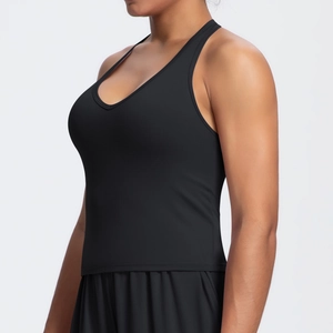 Detailed side view of black yoga tank top with V-neckline and elastic functional fabric
