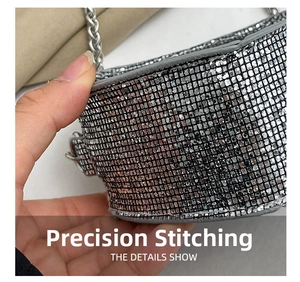Detailed close-up of silver sequin mesh texture and leather stitching on mini chain bag