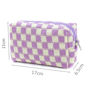 Macro detail of purple checkered knit makeup bag showing 17cm x 11cm x 6.5cm dimensions
