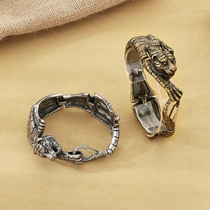 Retro tiger head bracelets in antique gold and silver finishes with a wild metal texture