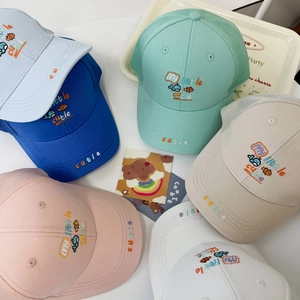 Detail of multi-color kids mesh baseball caps with whale embroidery and My Little Cutie text