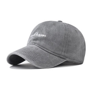 Vintage grey washed cotton baseball cap with white cursive Dragon embroidery detail