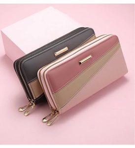 Detail of multi-functional women's double zipper long wallet in stylish patchwork design