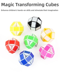 Close-up of seven colorful puzzle snake cubes folded into ball shapes on a white background