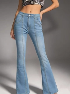 Women's light blue high-waisted flared jeans with decorative vertical stitching detail