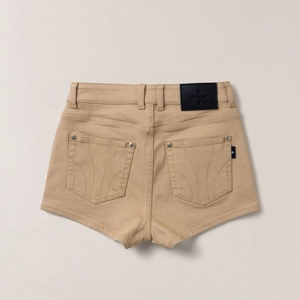 Back view of khaki denim shorts showing leather patch and cross logo detail