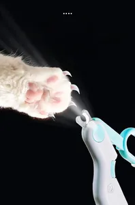Detail showing pet nail clipper with high-brightness LED light to see claw bloodlines