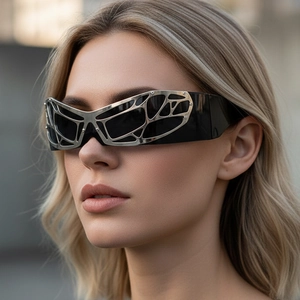 Futuristic Y2K wrap around sunglasses with silver mesh frame and sleek black lenses