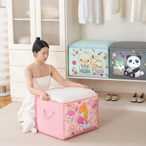 Detail showing cartoon storage bags being used to pack large bedding and clothes