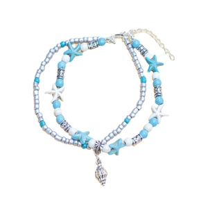 Bohemian multi-layer anklet with turquoise beads, starfish and seashell pendants on white