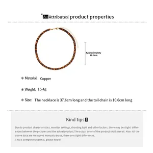 Detail view of leopard print snake bone chain with copper material and size measurements