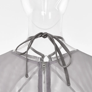 Close-up of gray mesh top featuring a halter neck tie and rear zipper closure detail