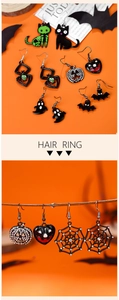 Detalle del set de pendientes de Halloween con calabaza, araña y calaveras de moda