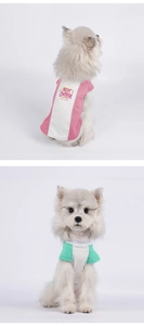 Close-up of lightweight cotton dog vest with Best Edition print in pink and green