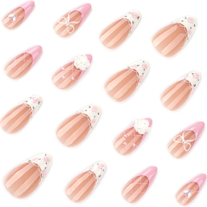 Pink French nails with 3D camellia flower and pearl accents on white background