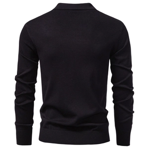 Detail view of the black knit sweater back featuring a textured collar and ribbed hem
