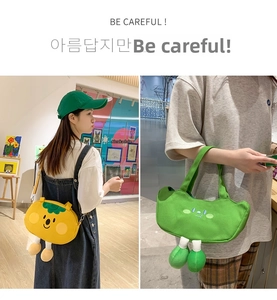 Close-up of cute cartoon plush bags with 3D legs in yellow and green finishes