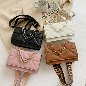 Rectangle quilted crossbody bags in four colors with wide jacquard straps and chain detail