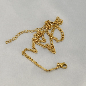 Golden Figaro chain necklace in 18K stainless steel with lobster clasp and extender