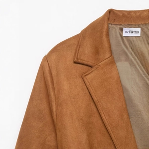 Caramel faux suede blazer for women featuring a notched lapel and fine stitching
