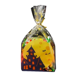 Transparent Halloween gift bag with moon and castle prints and gold twist tie