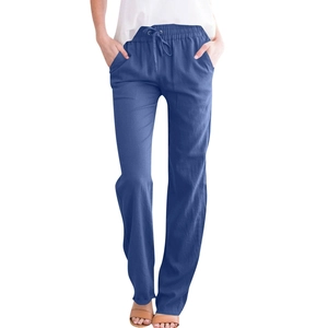 Detail view of blue cotton linen pants featuring drawstring elastic waist and side pockets